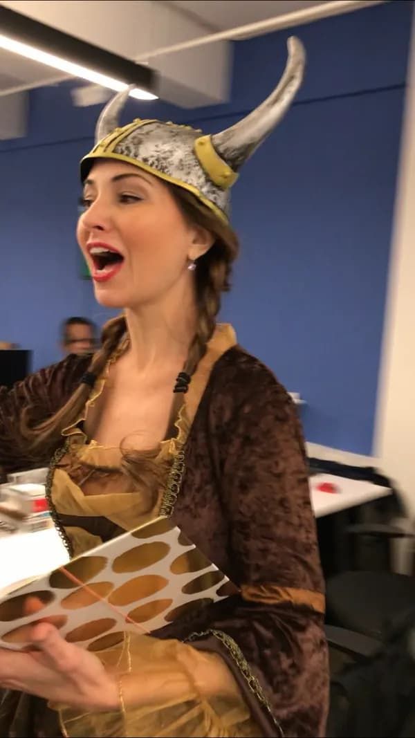 Singing telegram girl performing in costume