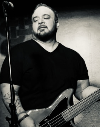 Ninos Khanania - Bass
