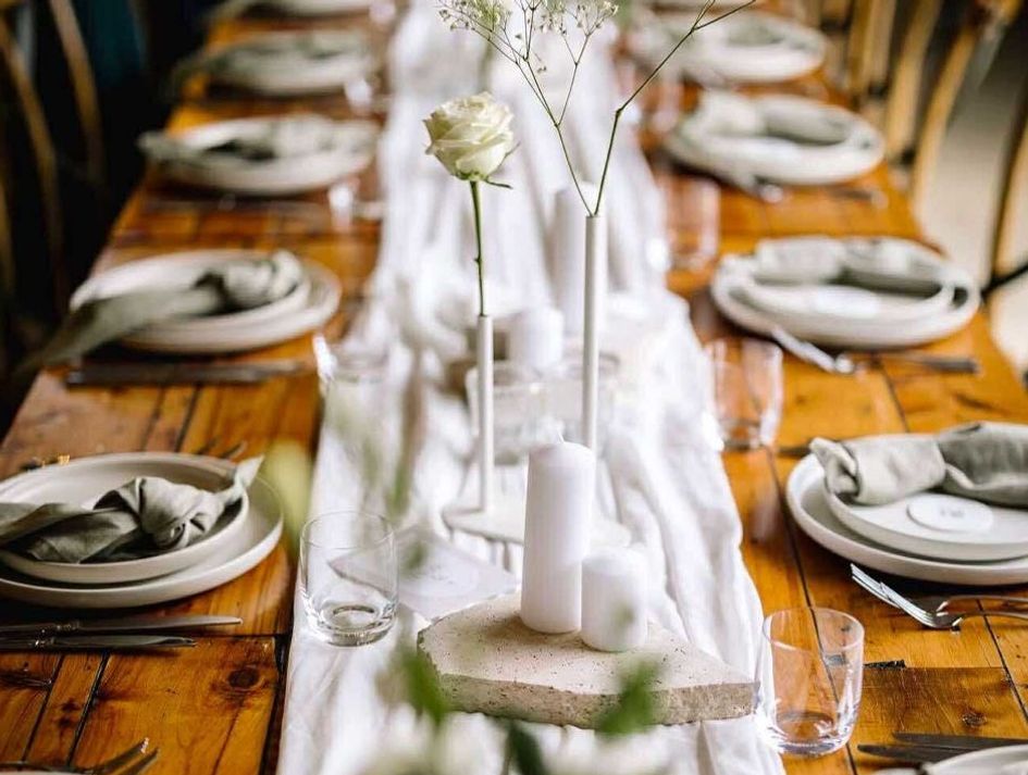 Intimate wedding and party styling with florals, candles, guest book and wishing well table. Our Tier 3 package offers stunning, affordable décor for unforgettable Canberra events.