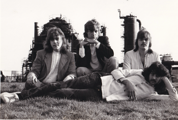 This is Jon's first band "The IOSIS Band" photographed in Seattle. Jon is on the far left.
