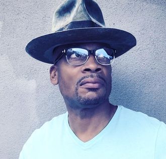 jonchristopher_hat_goatee_glasses