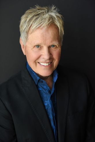 Jim Gerber profile photo smiling in black suit jacket