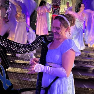Strolling electric harp performance by Shelley Otis at a Bridgerton Ball with DJ and dancers