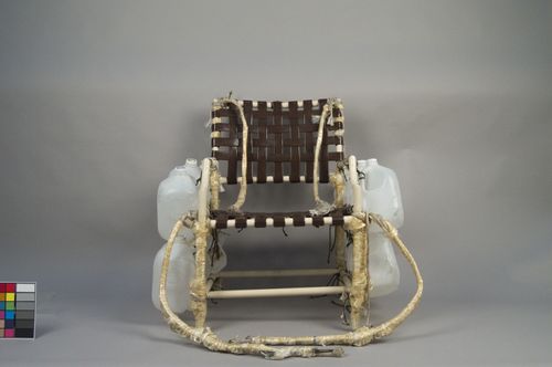 Lawn Chair Larry's char with water jug ballasts