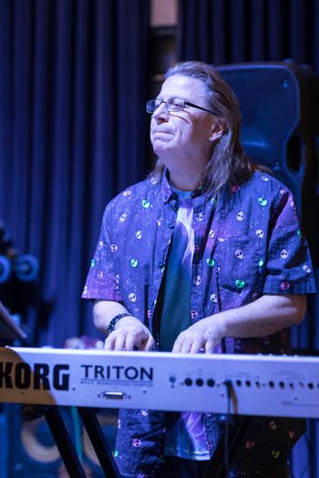 Phil typing away on the keys!
