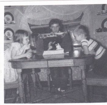 Denny Carleton with puppets and sisters Judy and Diane
