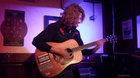 Kathleen sitting in with songwriters by invite