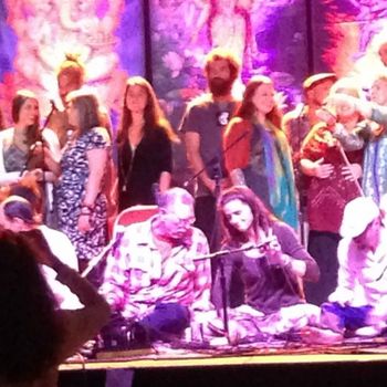 Krishna Das showing me the words to the Hare Krishna chant (lol!)- thank you for this pic, Kathy Sco Yes, this was the memorable night of the ilicit arse squeeze for KD that got him up and dancing for the first time at Bhakti Fest. In this pic, he had no idea it was a-comin' for him.

