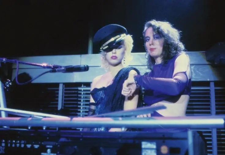 Jill Jones and Lisa Coleman during the 1999 Tour era. Jill Jones is documented here as a key vocal support, famously providing background vocals for Vanity 6 from offstage during every performance as part of the live production.