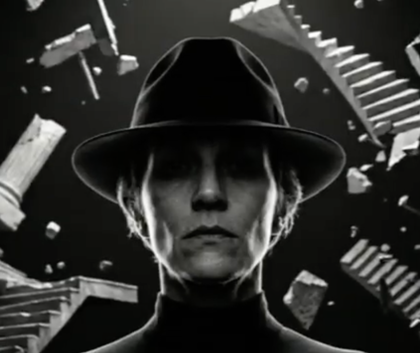 “Media Line Road promotional artwork showing a surreal monochrome portrait with floating architectural elements.