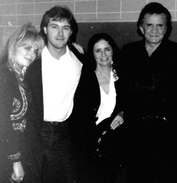 Photo by Mark Pyle, brother of Carlene's guitarist Michael Pyle (pictured) who wrote: "We were opening for George Strait at the old Mid-South Coliseum in Memphis. Johnny and June walked out on stage unannounced to sing a song with us and I vividly remember the blinding light of ten thousand flashbulbs going off all at once."
