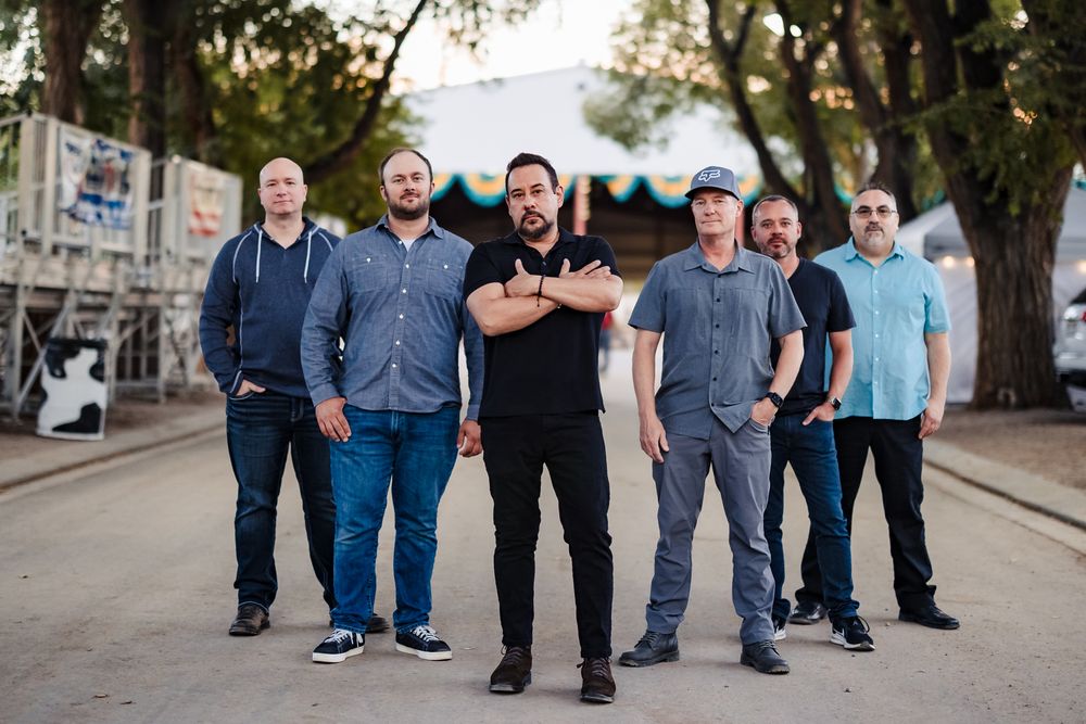 The Martini Shot live music party band promotional image showcasing their high-energy performance style