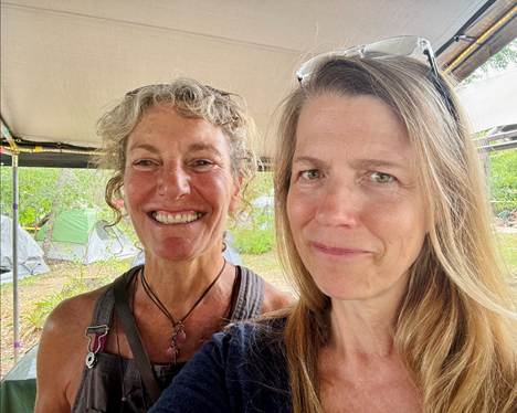Two women taking a selfie

AI-generated content may be incorrect.