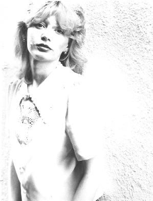 Early career publicity photo in my favorite pink blouse.
