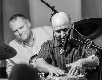 A very nice moment in time - on my way in to the infamous Van Dyke to see Mike Benedict's (L) wonderful event featuring 4 drum set players he invited me to go get a drum and sit in with them.  Wow! wh

