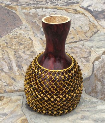 Absolutely beautiful custom Shekere made for me by Timbal Cornwell.  Sounds even more beautiful then it looks!
