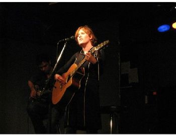 Playing guitar at the Rivoli

