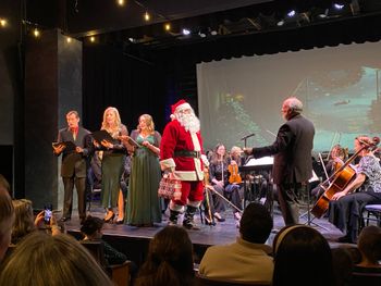 Santa has arrived for a visit with conductor Steve Eva and plenty of candy canes for the audience!
