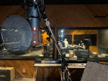 View from the vocal booth at Pete Tokar's studio - I spy Allan Licht and Pete Tokar in the control room.
