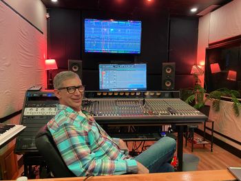 Allan Licht listening to the progress on his gospel song
