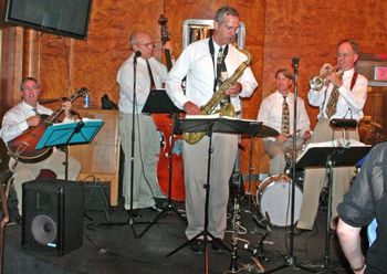 The whole band including guests Paul Johnson on drums and Dave Eastly on bass
