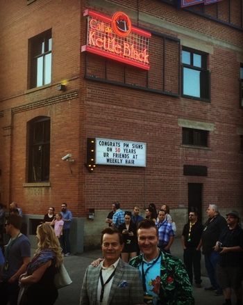 Darcy Kaser & Randall MacDonald at the induction into the outdoor Neon Sign Museum of their business sign Call the Kettle Black May 17, 2016
