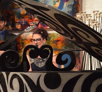 At Steve Jensen's beautiful hand-carved baby grand.

