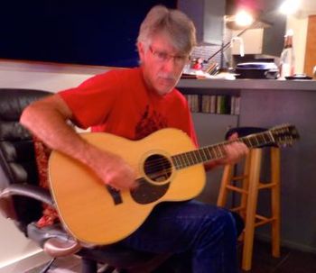 Scratch on Acoustic Guitar
