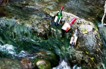 I WISH THE RIVER WAS WHISKEY
