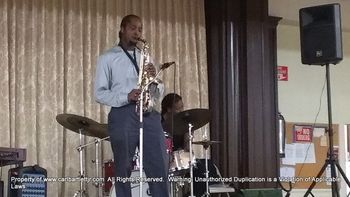 Soloing @ St. Cyprian's Church!  Drummer Extraordinaire, Shirazette Tinnin in the Background!

