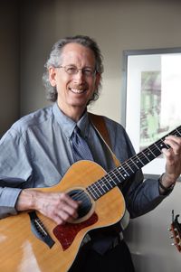 Acoustic guitar and vocal performance