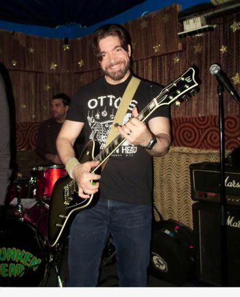 Matt on stage at Otto's Shrunken Head, December 13, 2025
