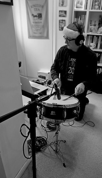 A seasonal Mark playing brushed snares. Photo by Malcolm Galloway.

