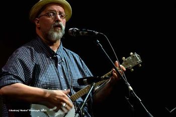 ME at The Linda in Albany Here I'm playing Tom Waits' "Jockey Full of Bourbon" on a $70 Harmony tenor banjo. Used once, and gone.
