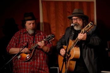 ME and Peter Case at Caffe Lena Is there a better living songwriter in America than Peter Case? I doubt it. Love it when he asks me to play the blues. Photo by Al Goldberg.
