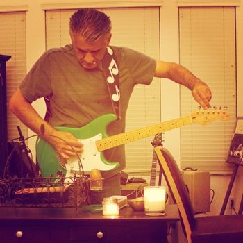 2014-09-14_19_53_37-1 Dave with his green Fender EC Strat named "Dot". Working on the demos for his forthcoming solo record.

