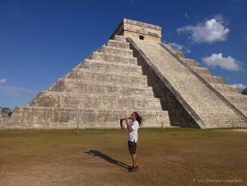 Emiliano at Chichen-Itza, Mexico Emiliano playing a Mayan triple-flute at the Mayan pyramids in The Yucatan, Mexico.
