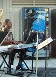 Throwback Hair Playing Carribbean Jazz

