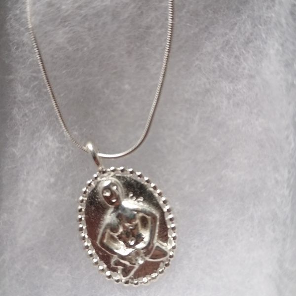 Hand finished Sheela na Gig necklace