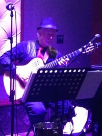 Solo Guitar while you shop for Maseratis