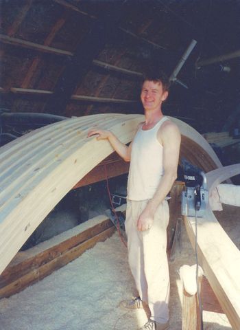 Dusk building beams for his unique home
