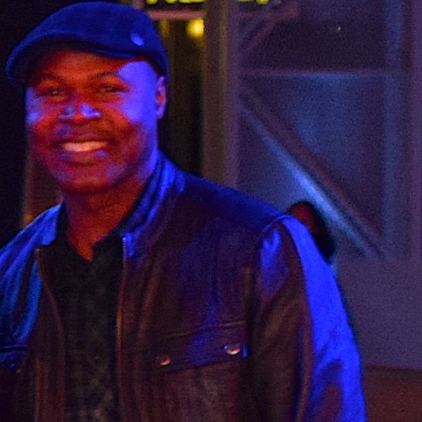 Kevin Julien smiling in music picture