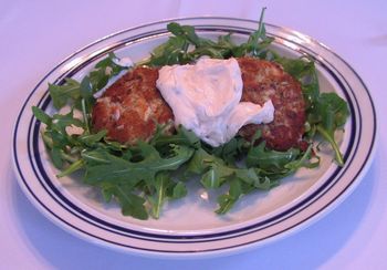 Tuna Potato Cakes with Tartar Sauce on a Bed of Arugula
