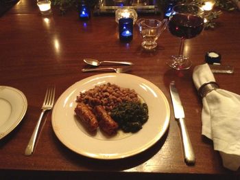 Hot Italian Sausage, Black-Eyed Peas and Sauteed Greens
