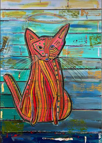 Orange Red Linned Kitty with Halo Against Barn
