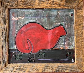 Red Cat in Wooden Frame
