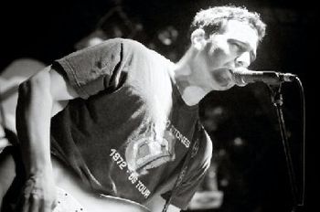 Tom at Bills Bar in Boston, MA performing with Seeking  Homer. (photo credit: Andrew Kelly)

