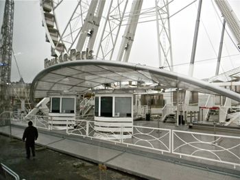Saturday morning, November, Paris.  The ferris wheel was not yet open for business.  Workers were festooning it with Christmas lights while we were there.
