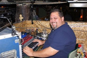Paul Rivers, VP of the VT chapter of GNG applies his magic touch to the sound board at our latest benefit for VT foster kids & GNG!
