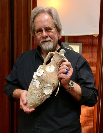 A gift from Ivo Segovic, of Edivo Vina, PCD showed this amphora to an audience after a screening of "Wine Diving in Croatia" at Our World Underwater. Photo: Monica Gephart
